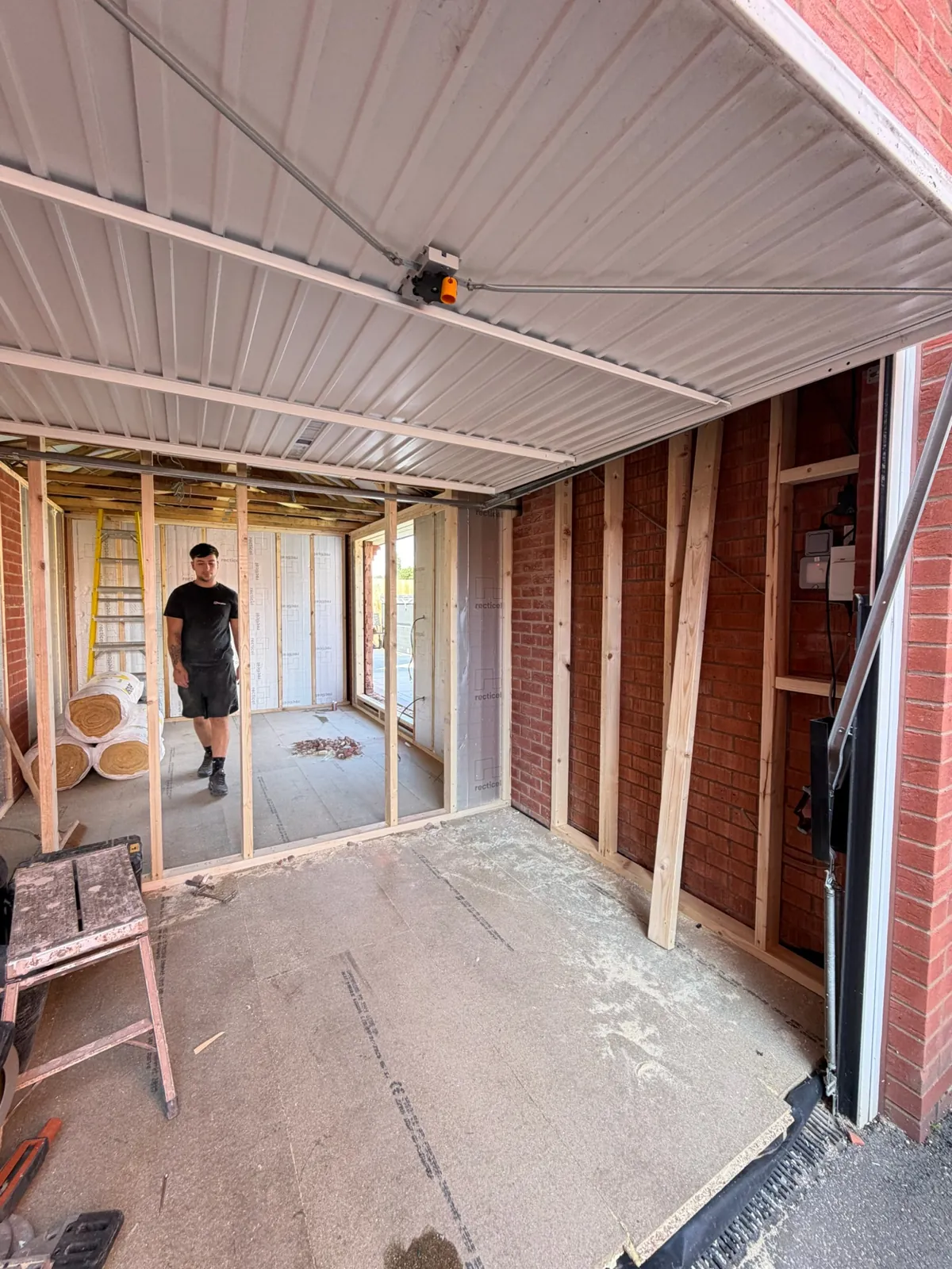 A garage partway through conversion by the Convert Your Garage team, before the floor finishes go down.